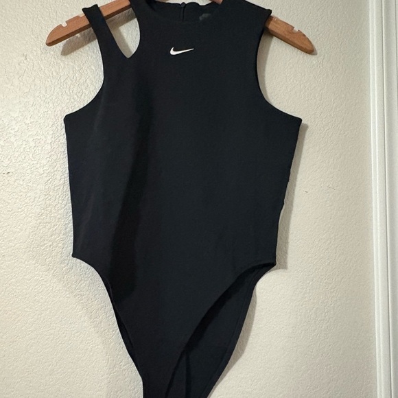 Nike Black Sleeveless Bodysuit NWT
Size M. Cute shoulder cutout detail. Stretchy - Picture 2 of 16